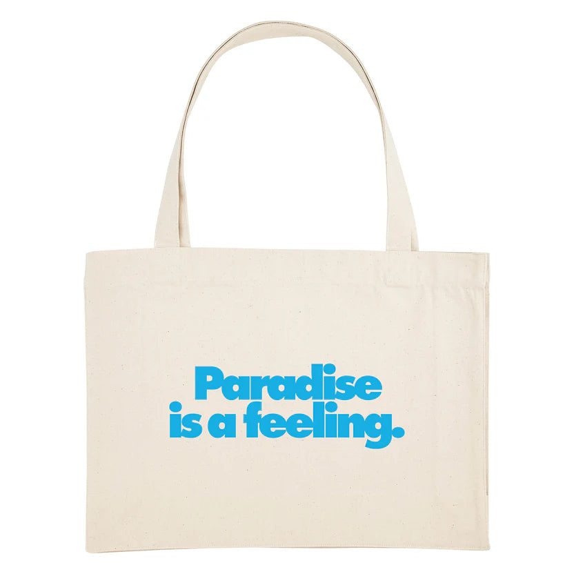 Tasche von Navucko mit blauem Text "Paradise is a feeling."